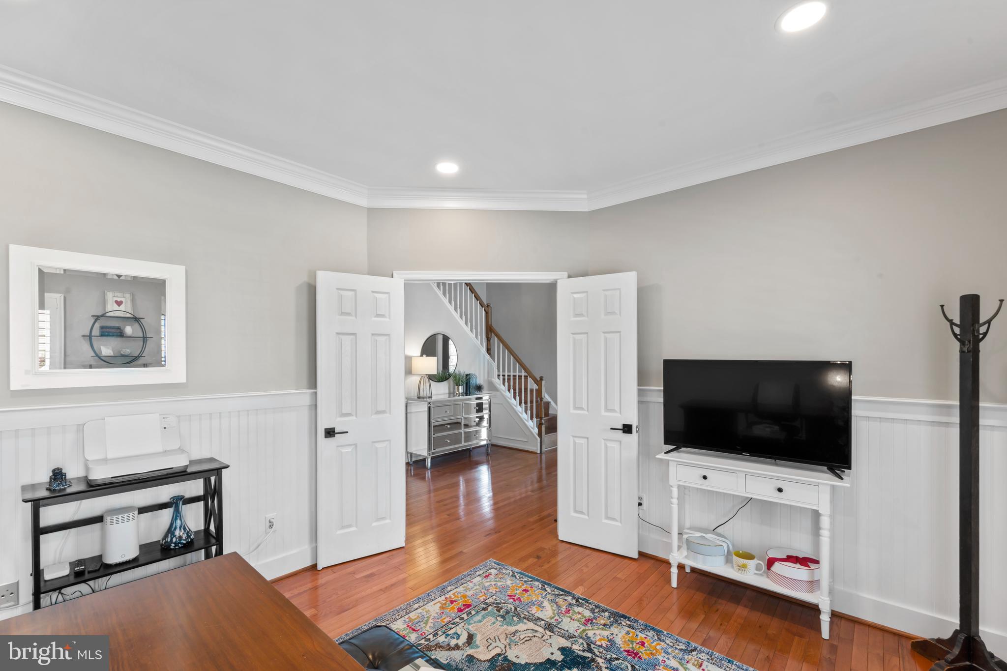2519 Fallon Drive Herndon, VA 20171 - Photo 29 of 107 a view of a livingroom with furniture and a flat screen tv