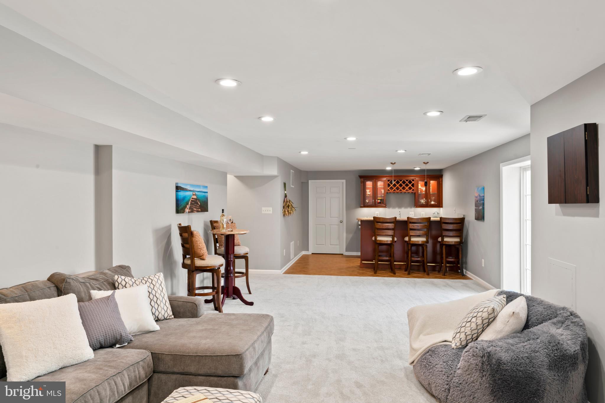 2519 Fallon Drive Herndon, VA 20171 - Photo 49 of 107 a living room with furniture and a flat screen tv