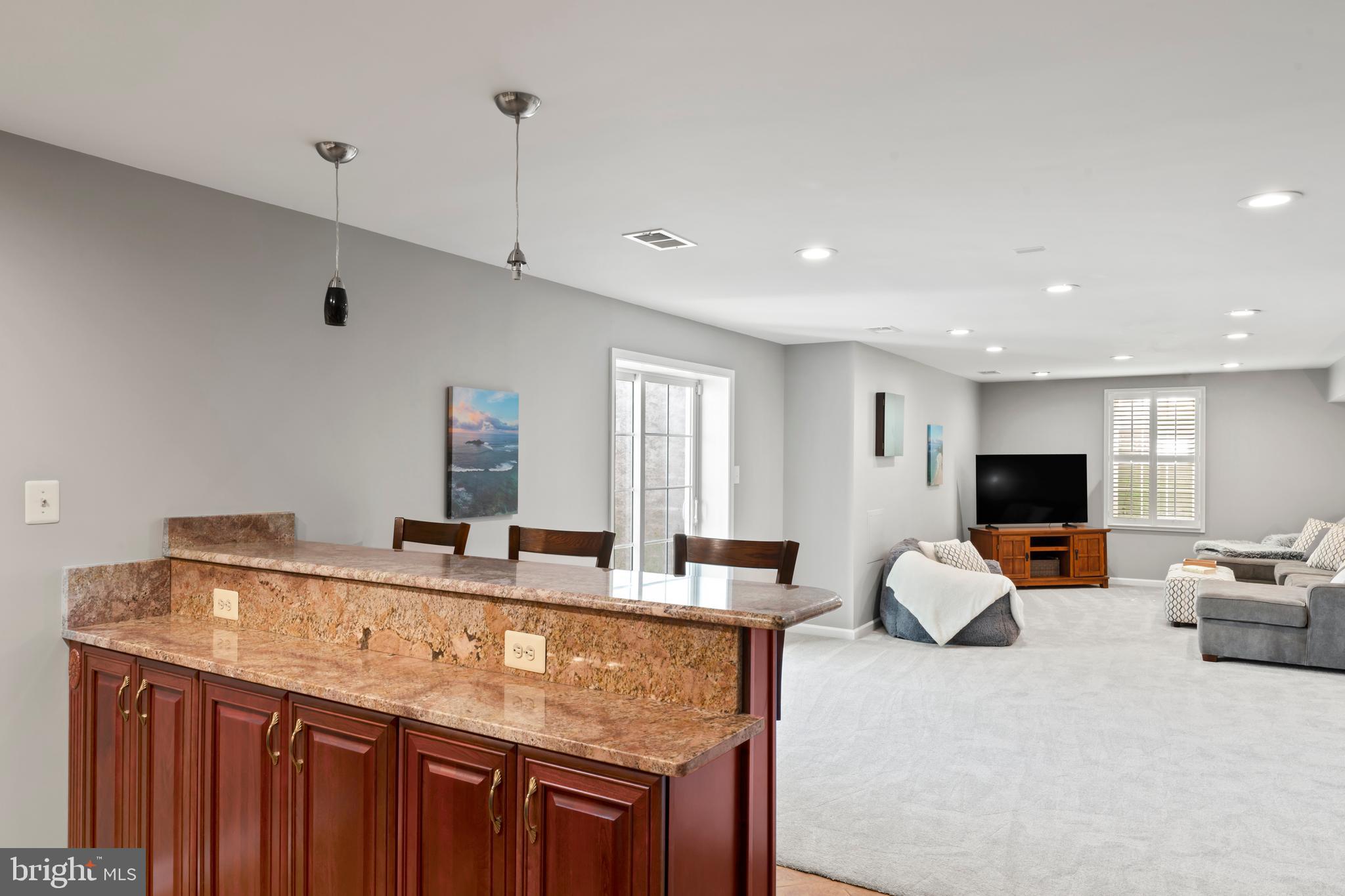 2519 Fallon Drive Herndon, VA 20171 - Photo 53 of 107 a kitchen with stainless steel appliances granite countertop a sink and a refrigerator