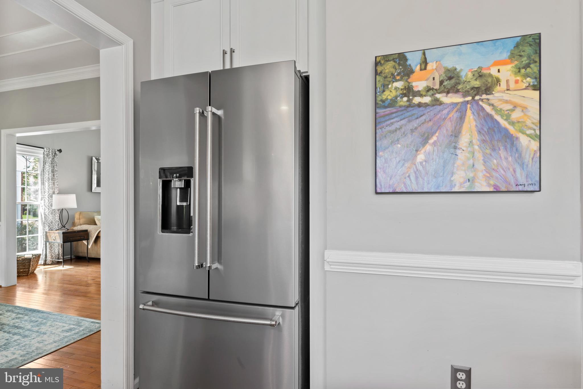 2519 Fallon Drive Herndon, VA 20171 - Photo 8 of 107 a metallic refrigerator freezer sitting in a kitchen