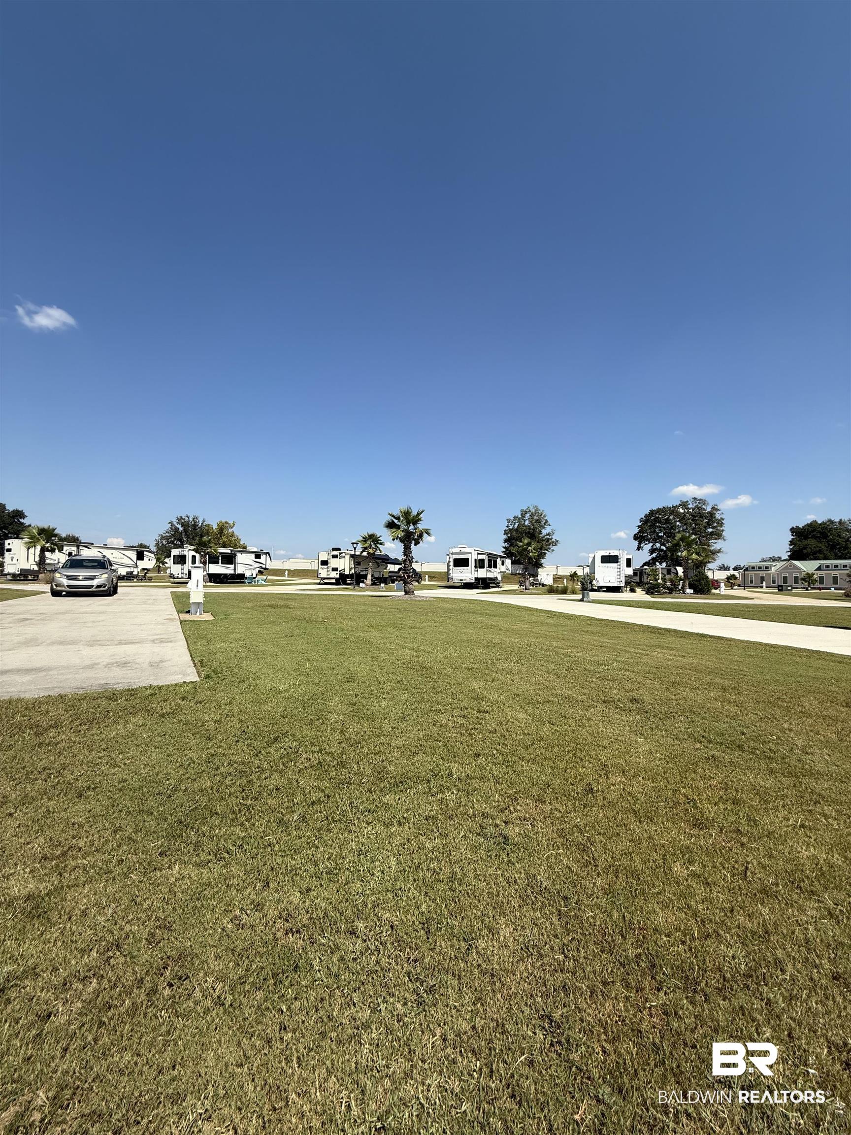 28086 Migratory Way Elberta, AL 36530 - Photo 8 of 46 View of home's community featuring a yard