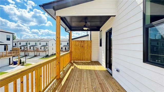 a aerial view of a house with swimming pool and sitting area