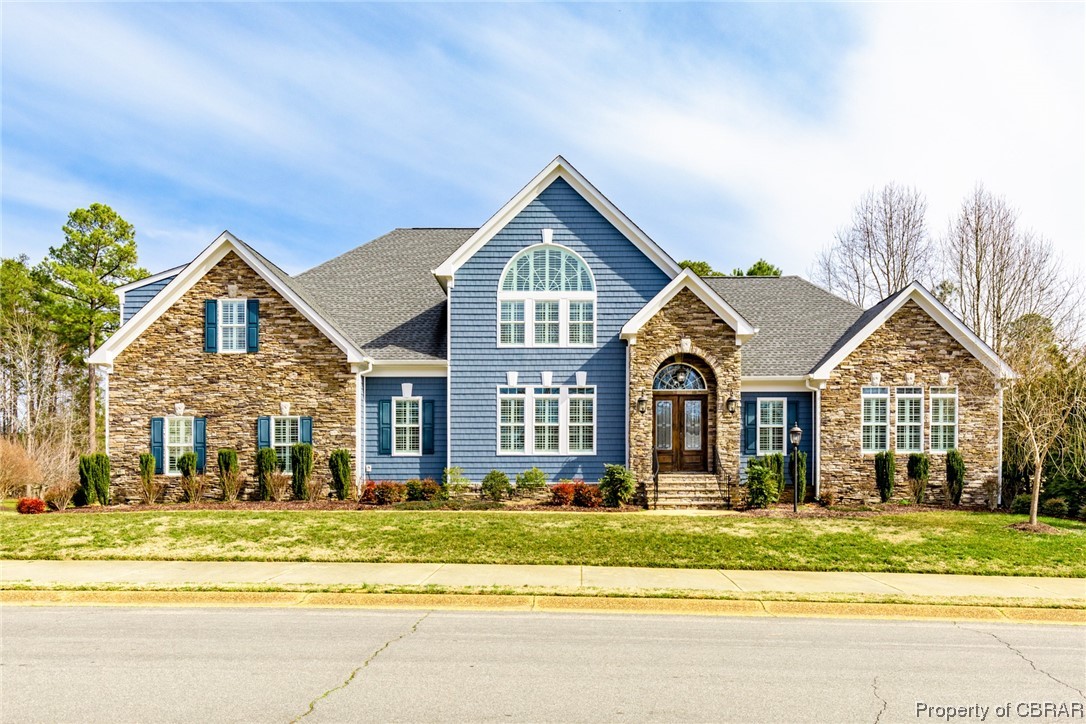 9900 East Cork Road Toano, VA 23168 - Photo 1 of 1 View of front facade featuring a front yard