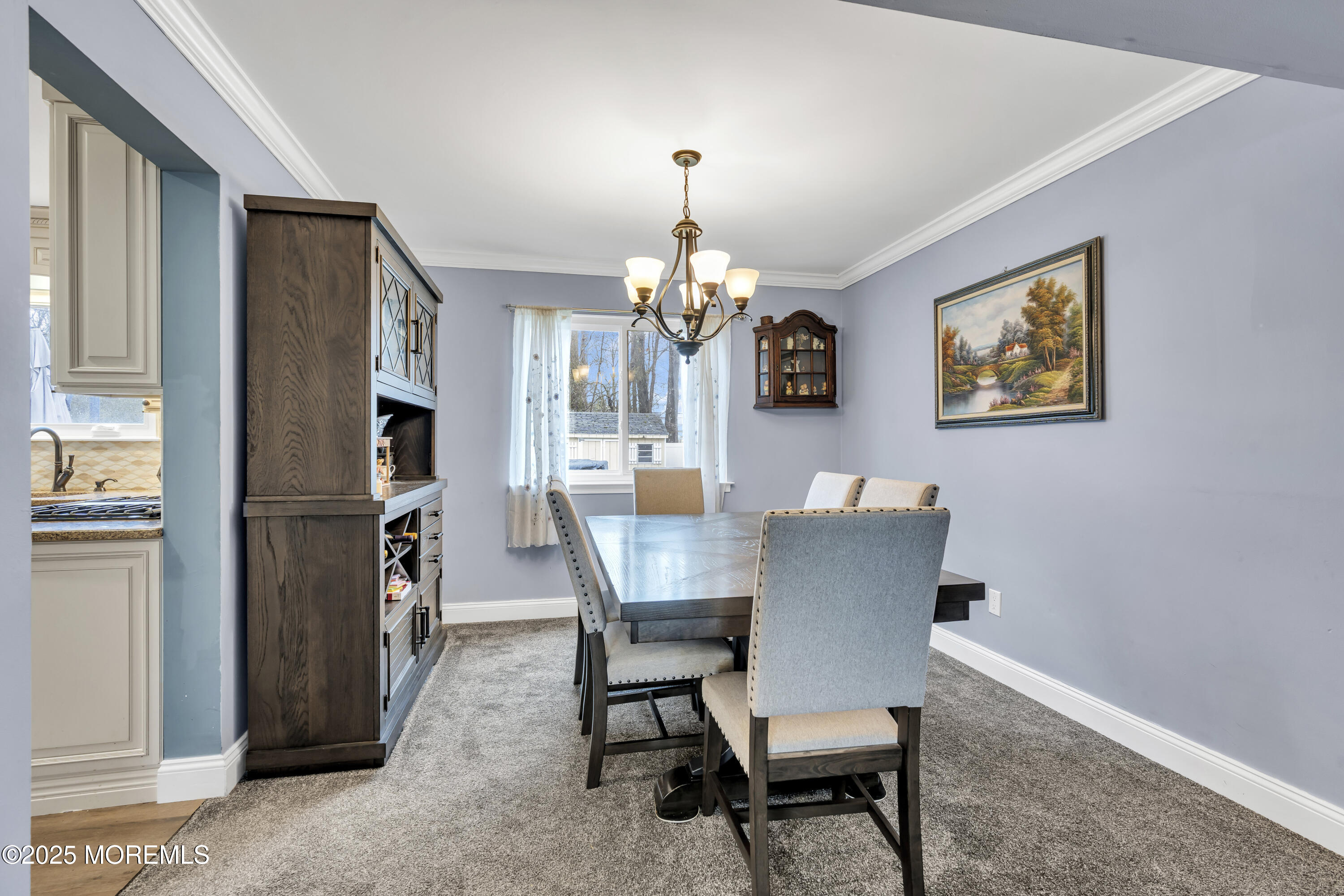 36 Appletree Road Howell, NJ 07731 - Photo 12 of 38 a view of a dining room with furniture and chandelier