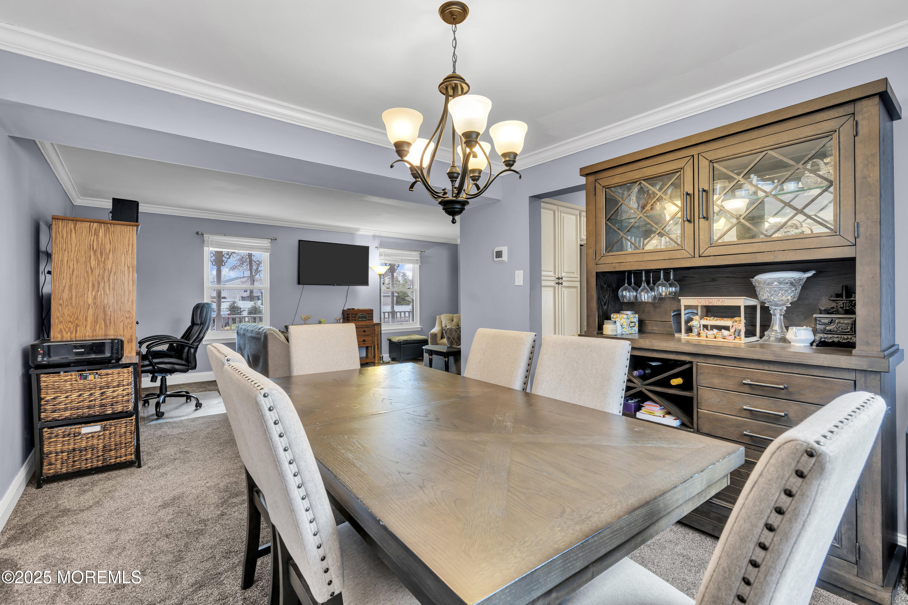 36 Appletree Road Howell, NJ 07731 - Photo 13 of 38 a view of a dining room with furniture a chandelier and wooden floor