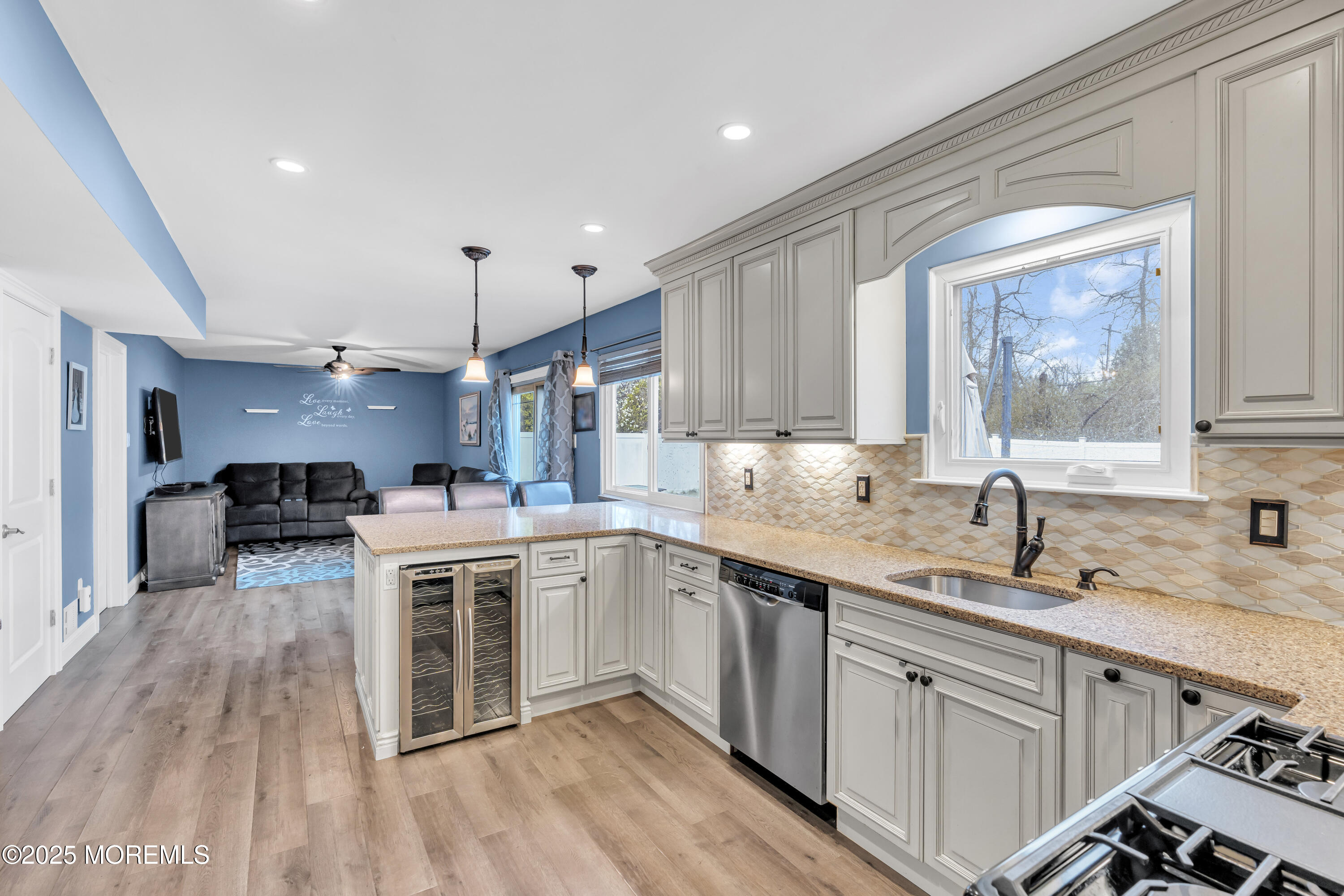 36 Appletree Road Howell, NJ 07731 - Photo 15 of 38 a kitchen with stainless steel appliances granite countertop a sink stove and cabinets