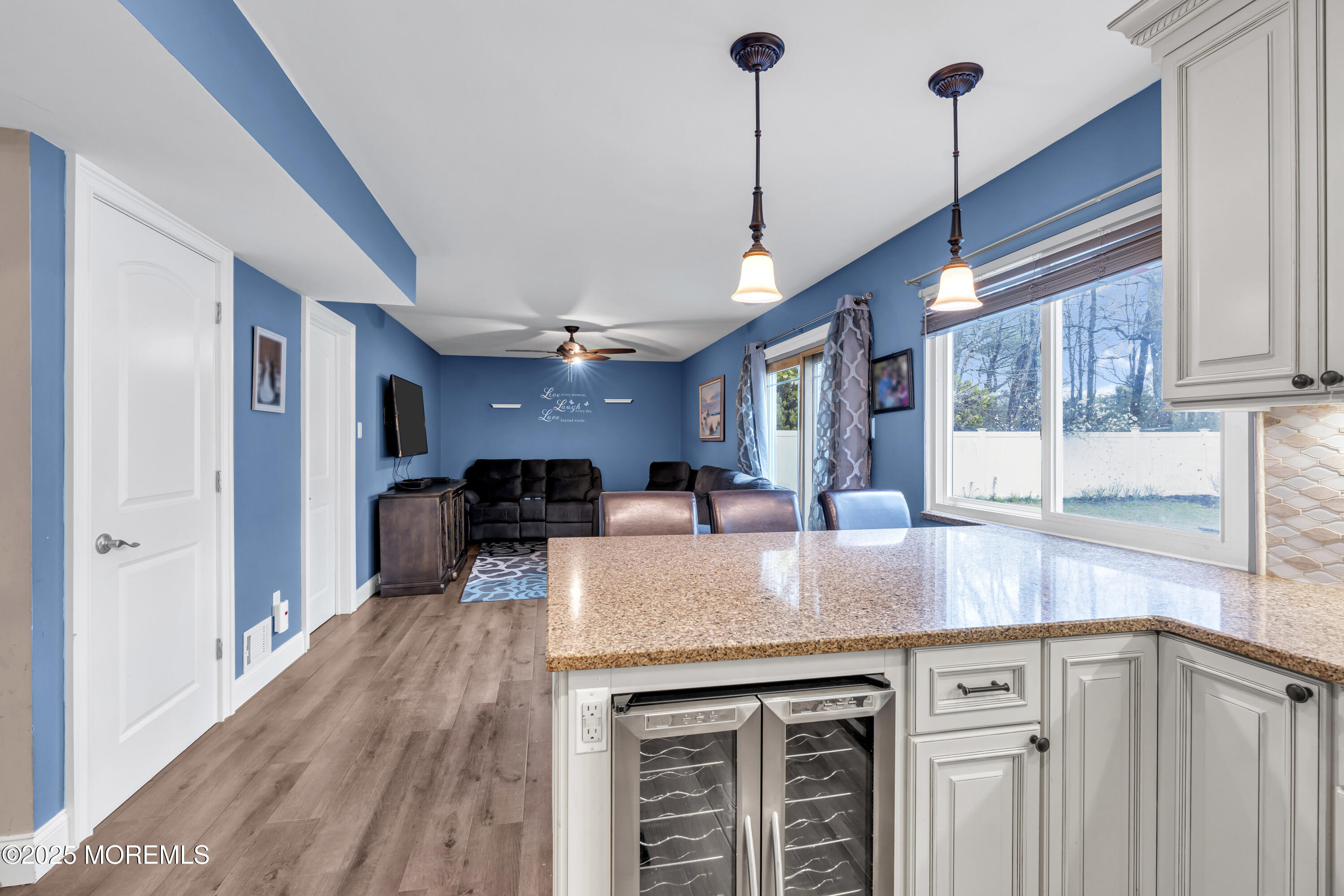 36 Appletree Road Howell, NJ 07731 - Photo 18 of 38 a kitchen with stainless steel appliances granite countertop a sink a stove and a wooden floors