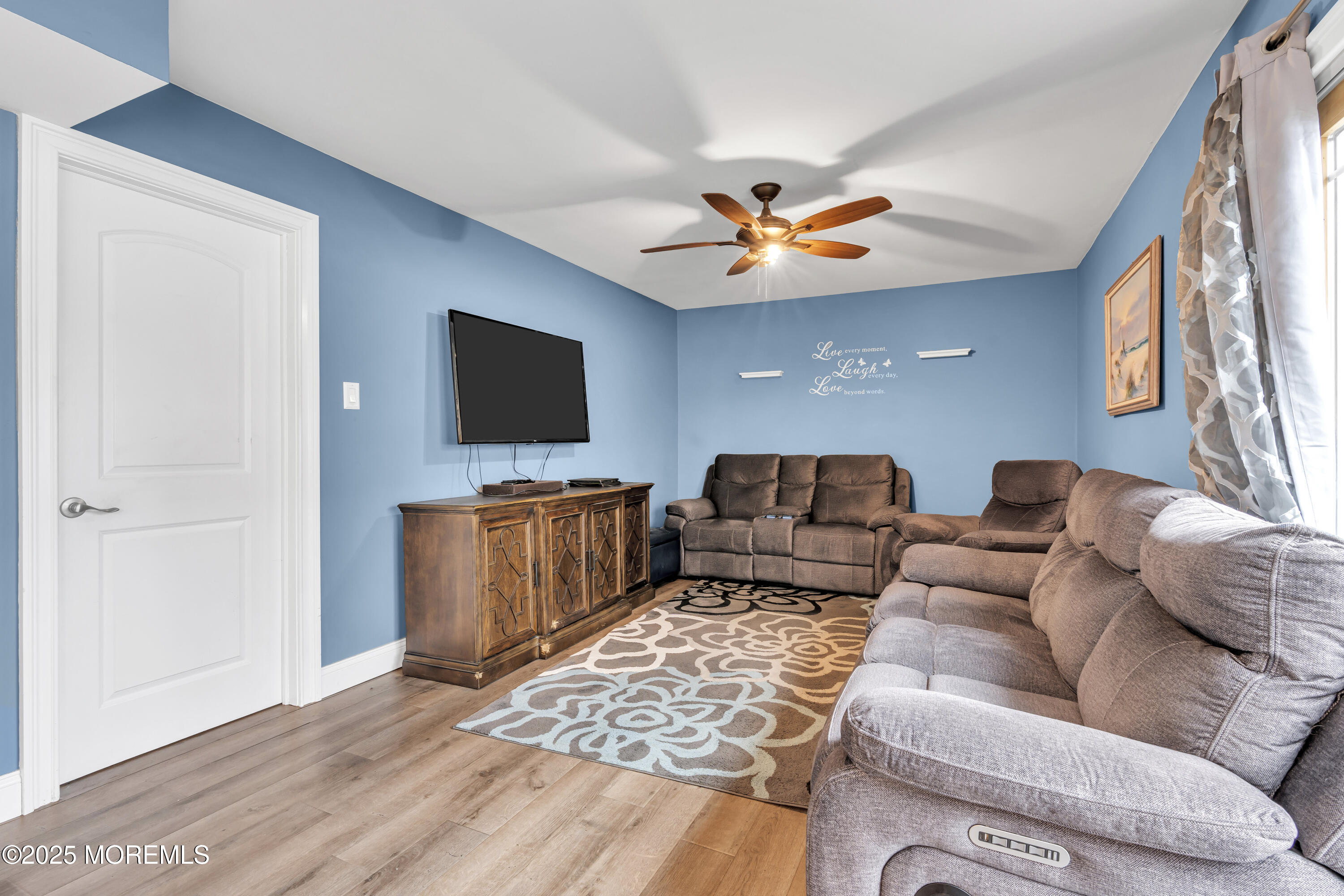 36 Appletree Road Howell, NJ 07731 - Photo 20 of 38 a living room with furniture and a flat screen tv