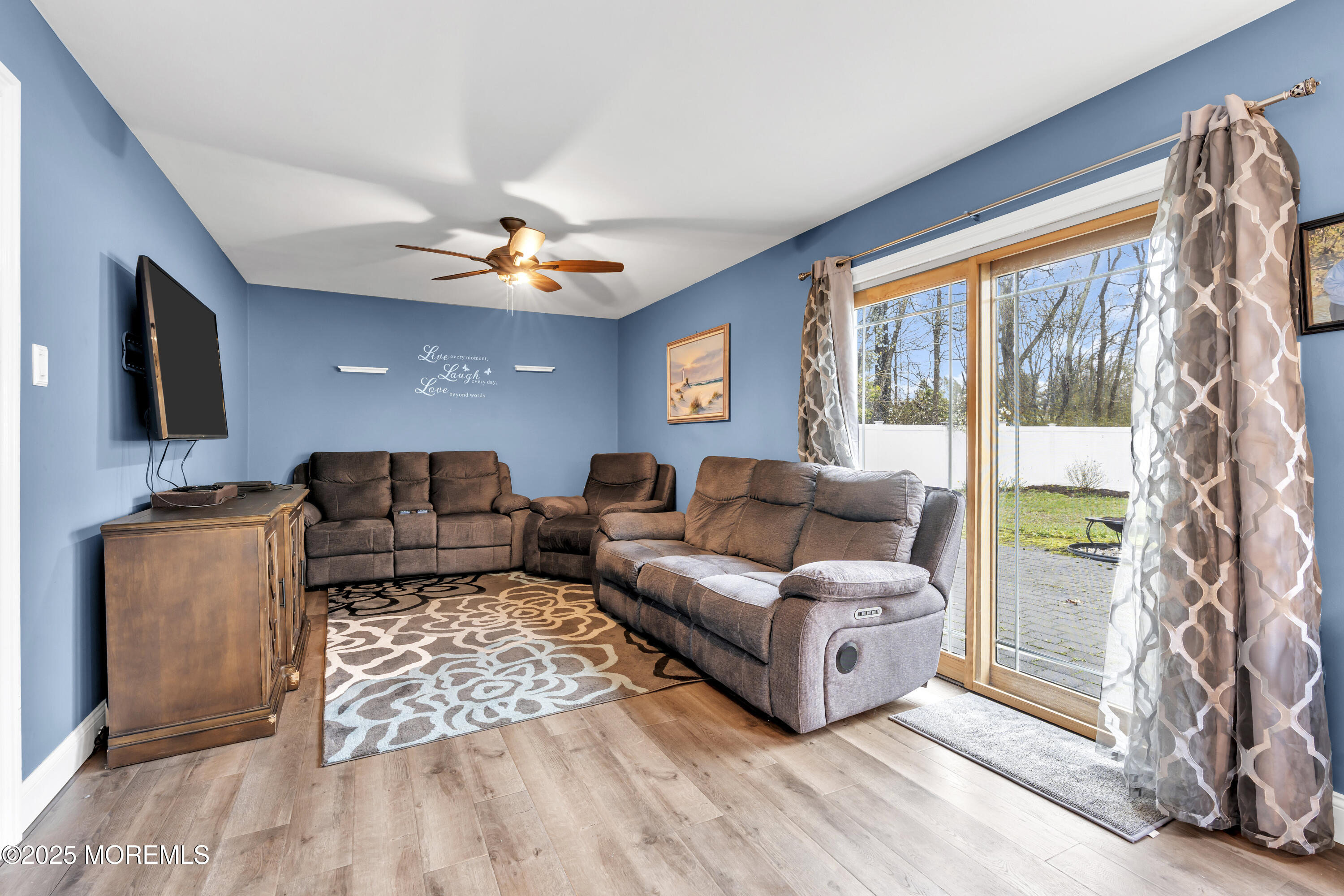 36 Appletree Road Howell, NJ 07731 - Photo 21 of 38 a living room with furniture and a flat screen tv
