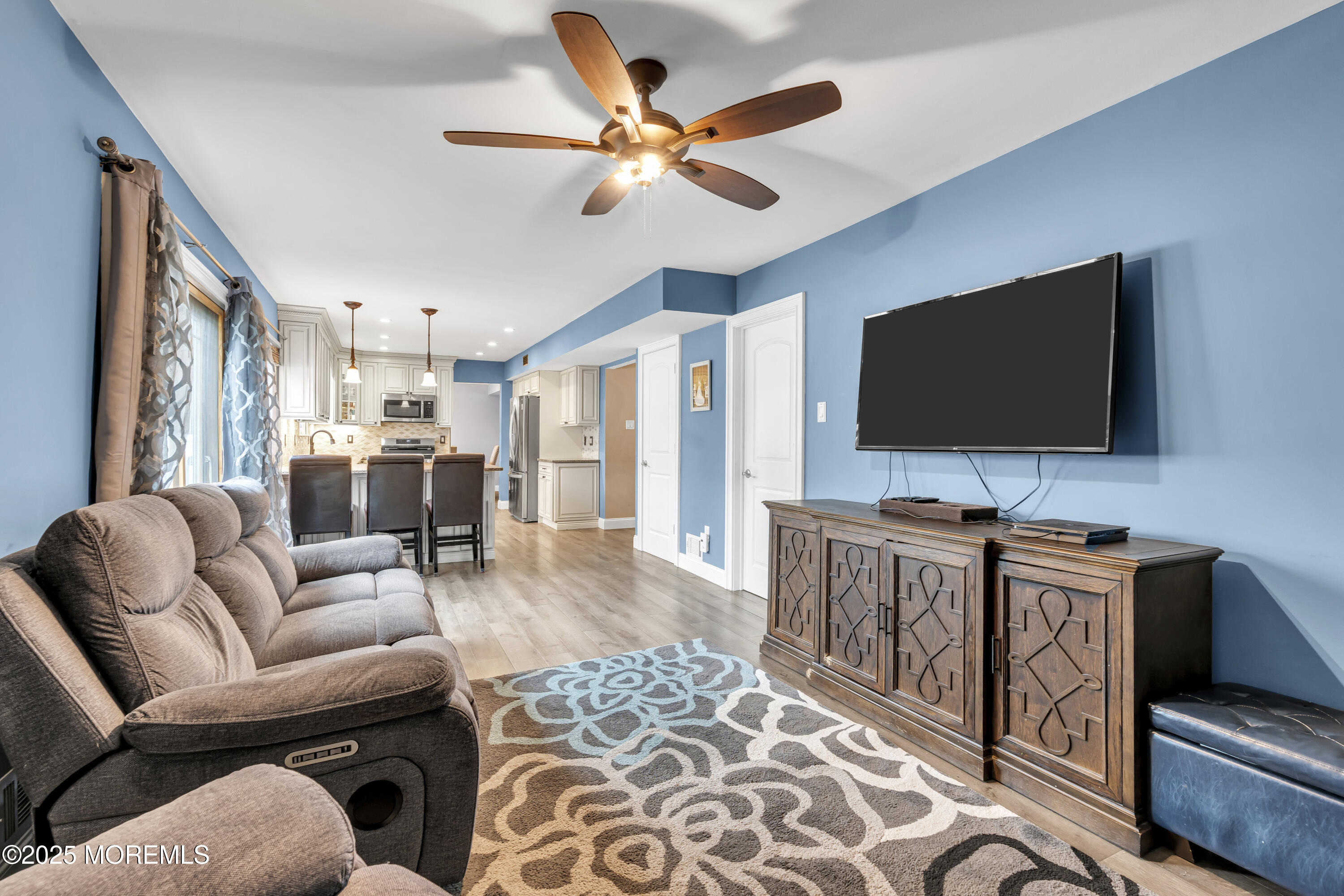 36 Appletree Road Howell, NJ 07731 - Photo 22 of 38 a living room with furniture and a flat screen tv