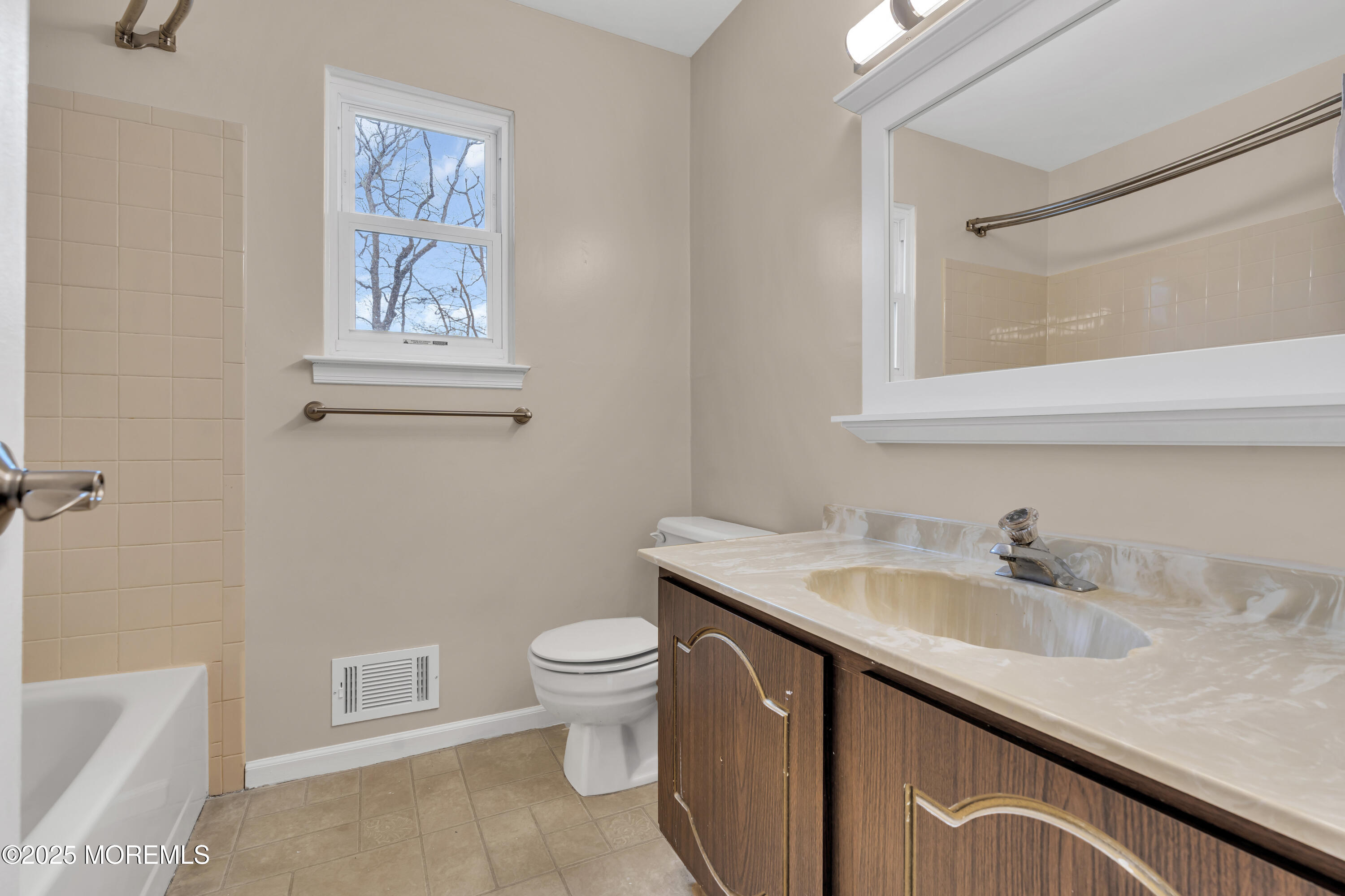 36 Appletree Road Howell, NJ 07731 - Photo 31 of 38 a bathroom with a sink and a toilet