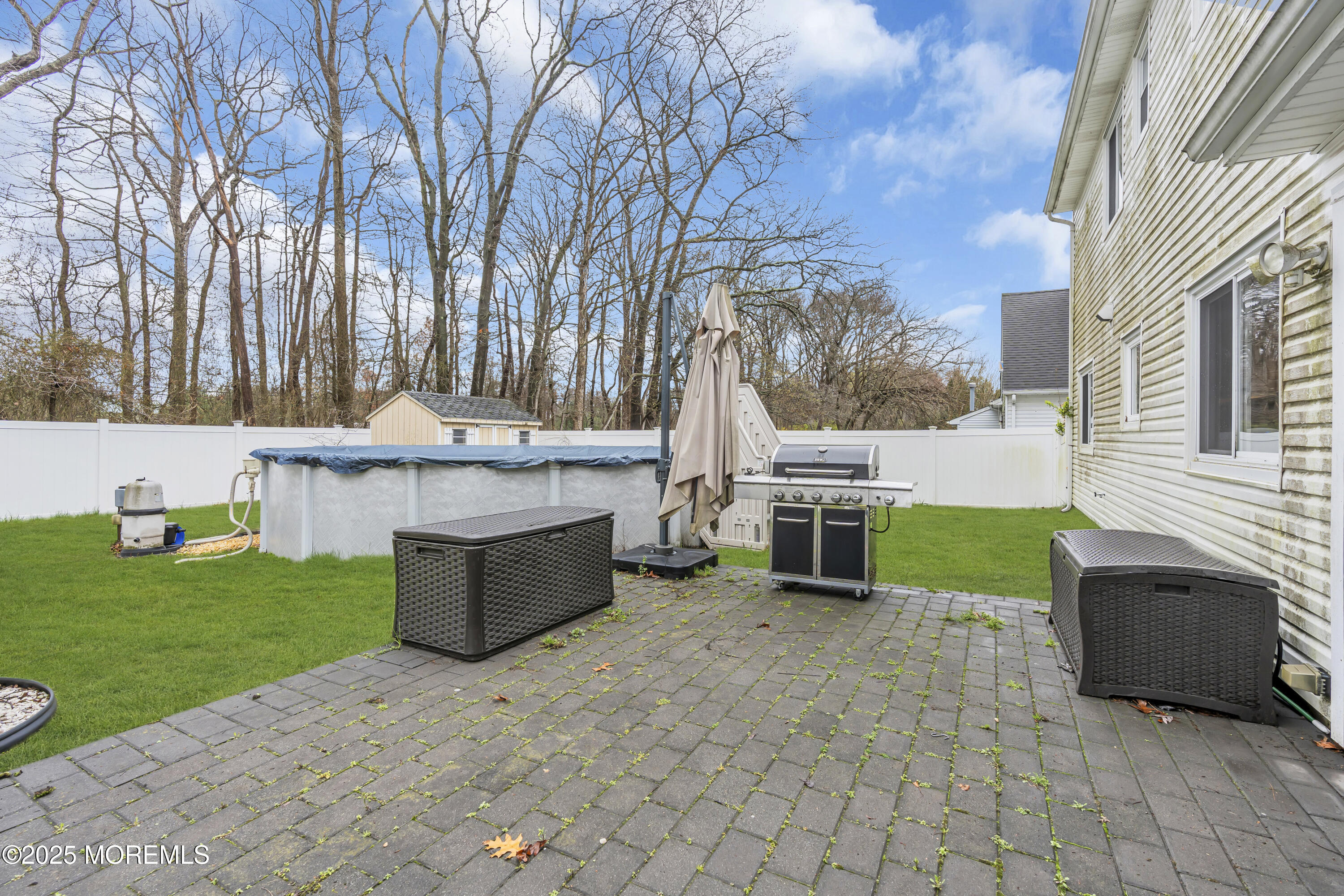 36 Appletree Road Howell, NJ 07731 - Photo 35 of 38 a view of a house with backyard and sitting area