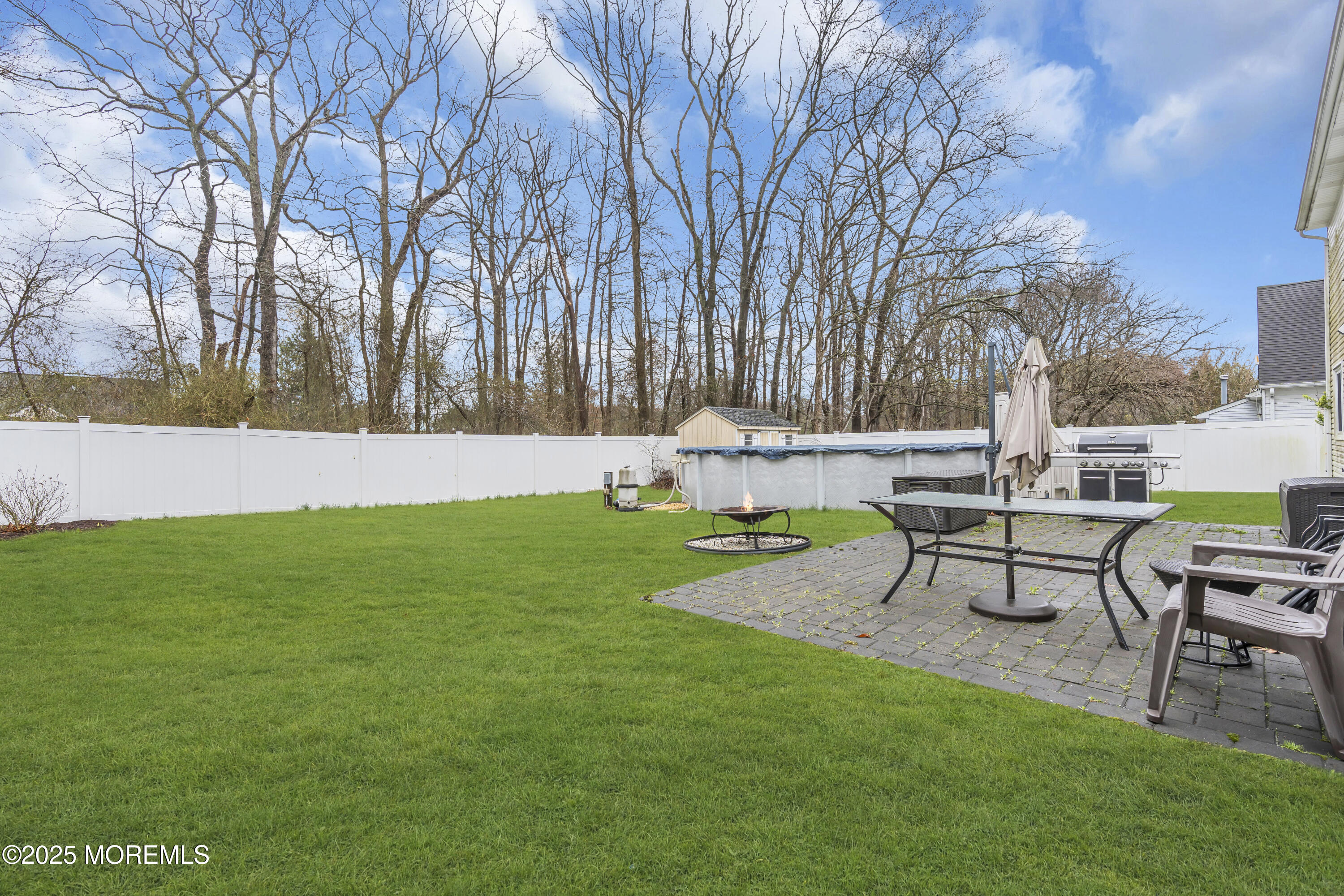 36 Appletree Road Howell, NJ 07731 - Photo 37 of 38 a view of yard with seating area and trees