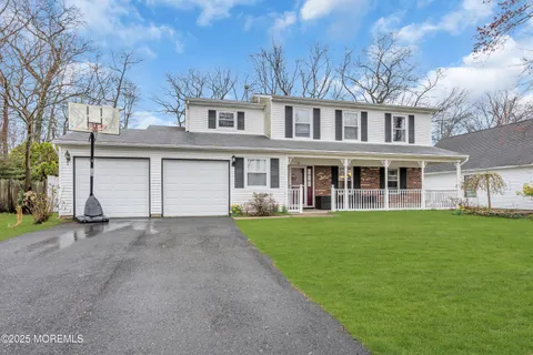a view of a yard in front of a house