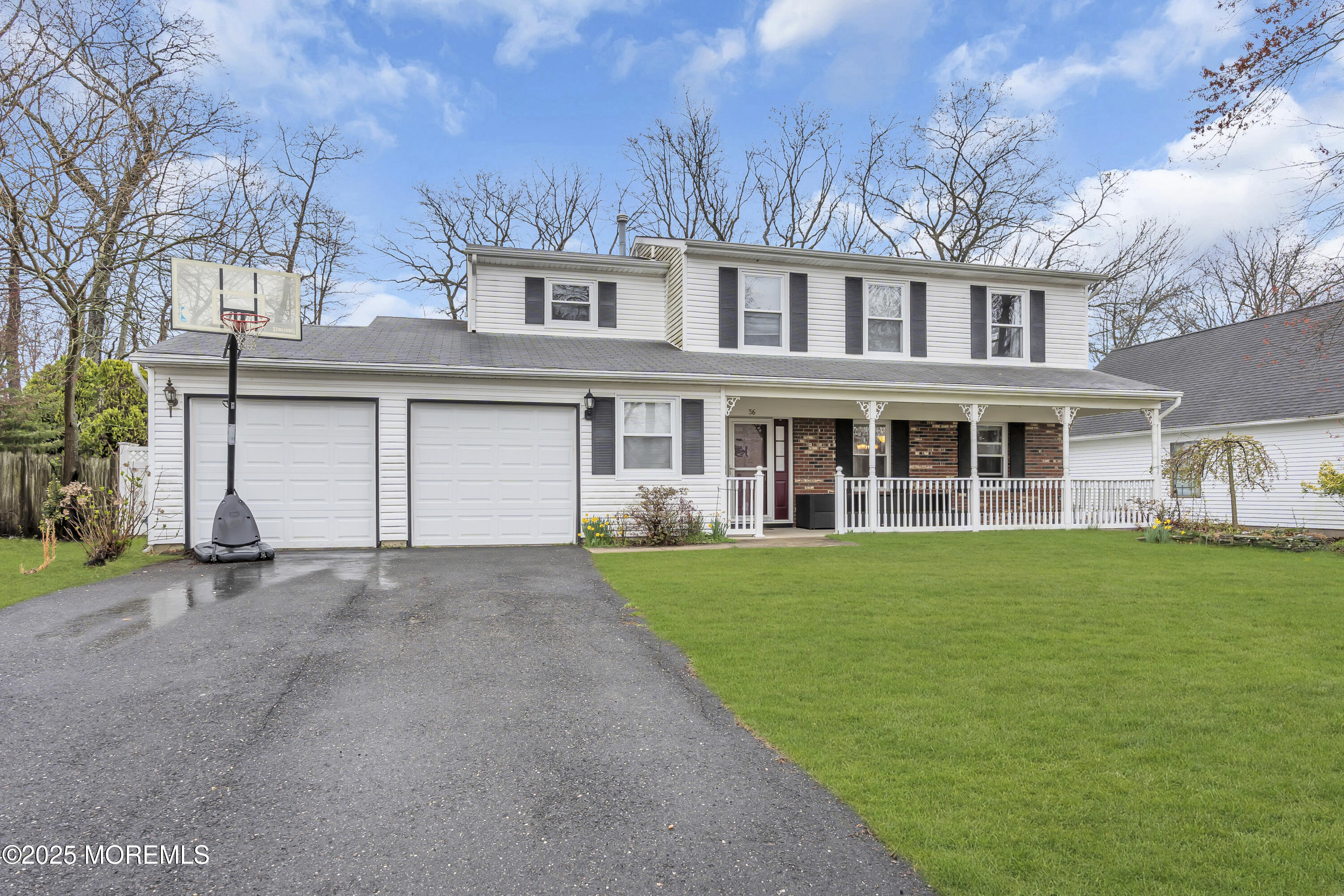 36 Appletree Road Howell, NJ 07731 - Photo 38 of 38 a view of a yard in front of a house