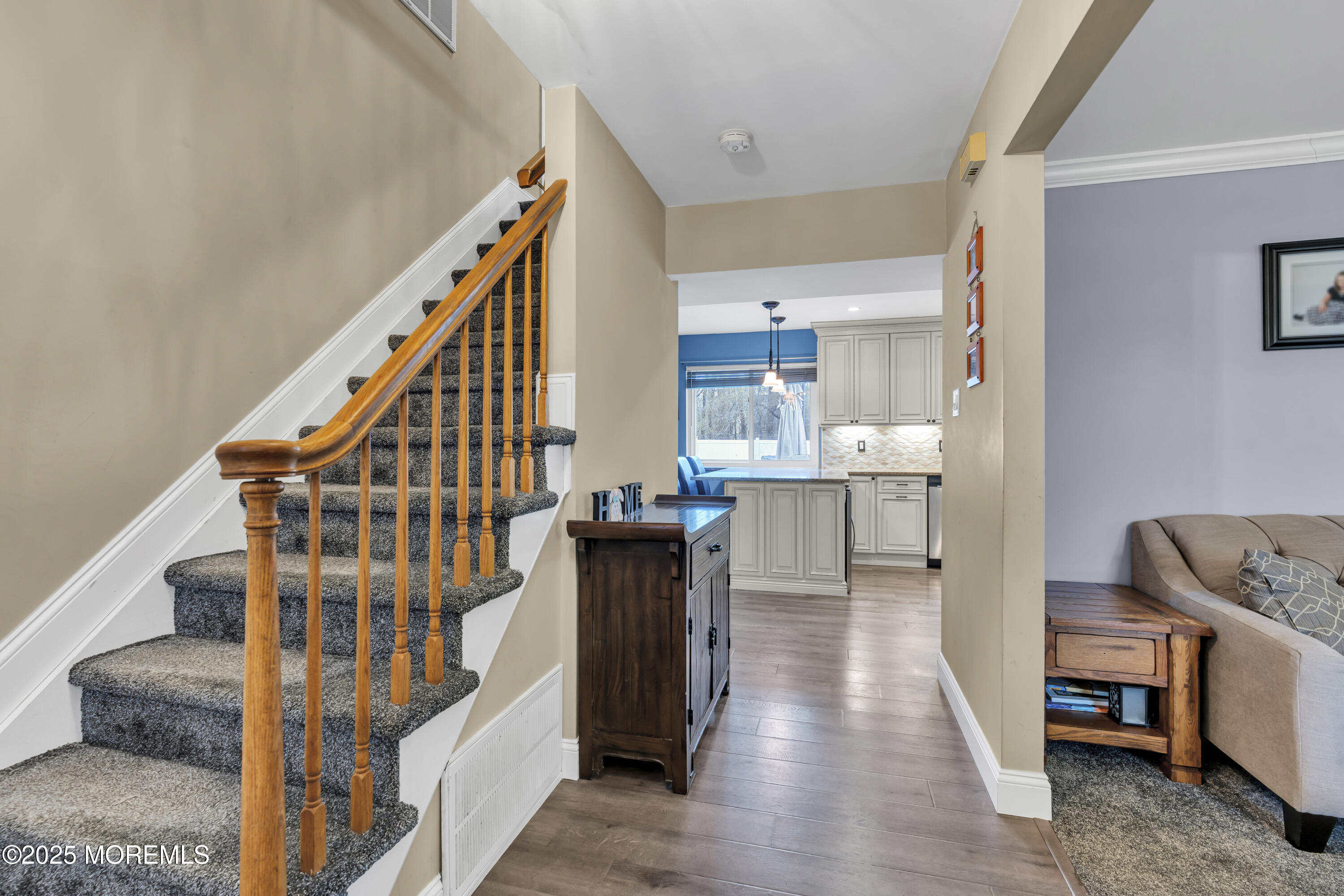 36 Appletree Road Howell, NJ 07731 - Photo 6 of 38 a view of entryway and hall with wooden floor
