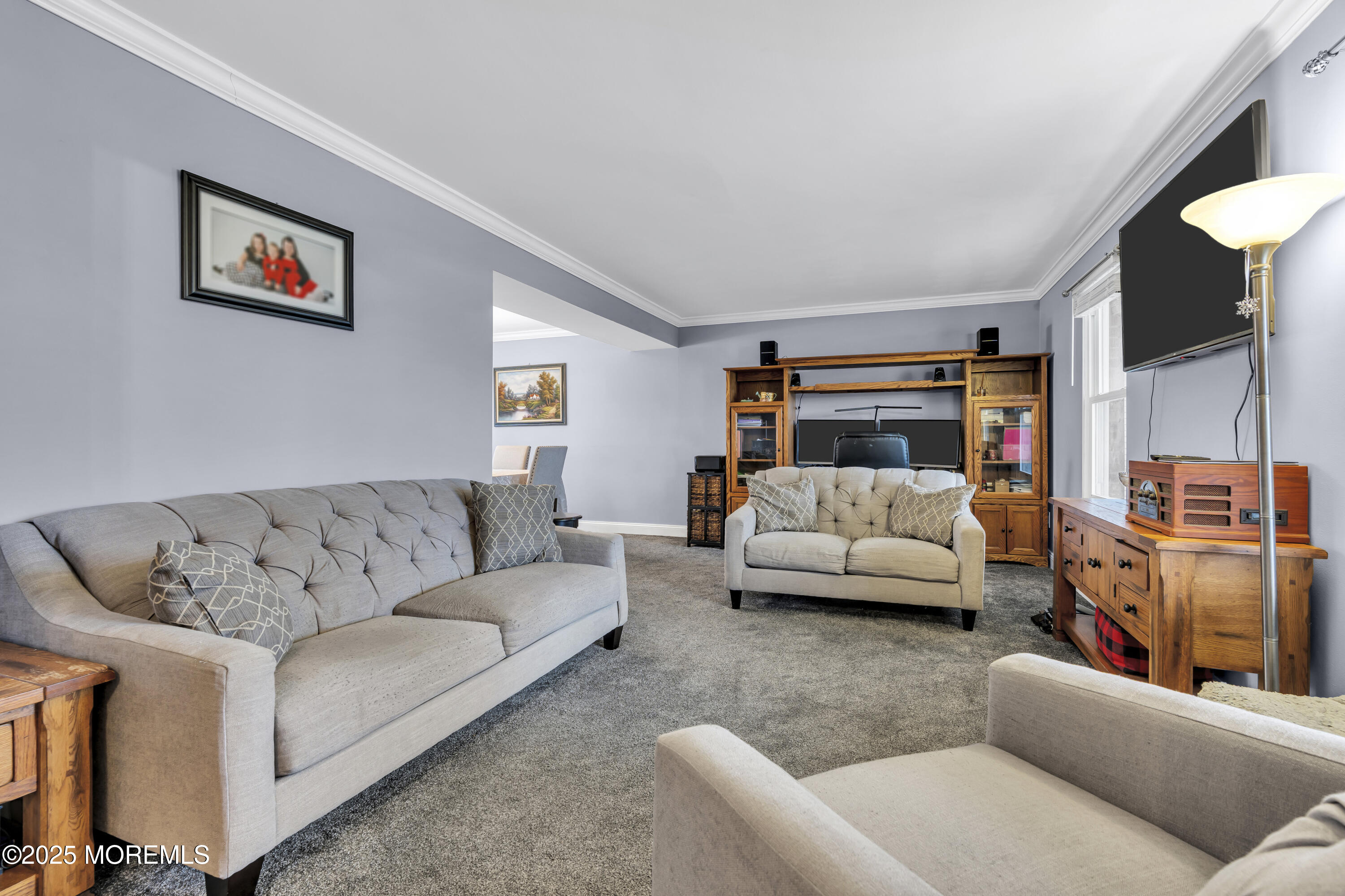 36 Appletree Road Howell, NJ 07731 - Photo 8 of 38 a living room with furniture and a couch