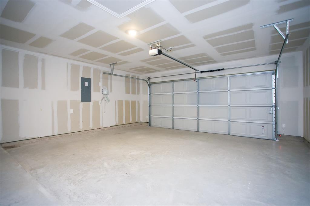 404 Castle Road Sherman, TX 75092 - Photo 21 of 25 a view of a garage