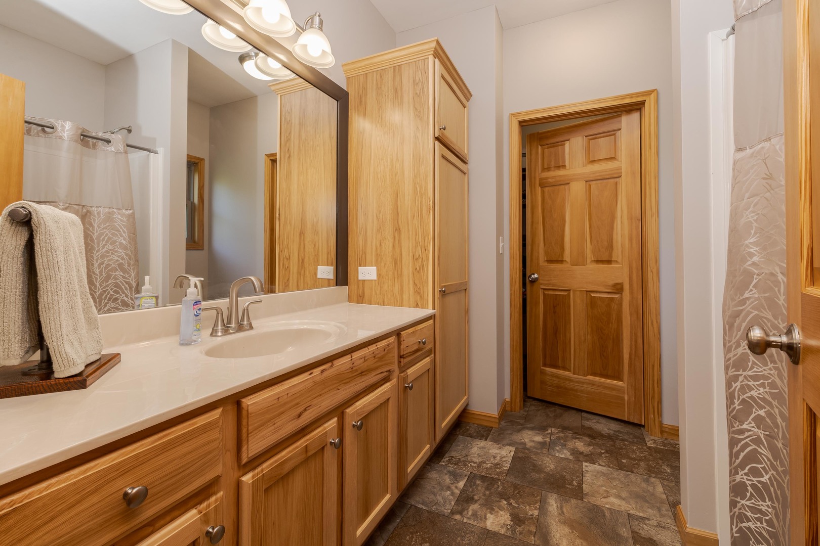 22037 East 2600 N Road Odell, IL 60460 - Photo 29 of 59 a bathroom with a granite countertop sink and a mirror