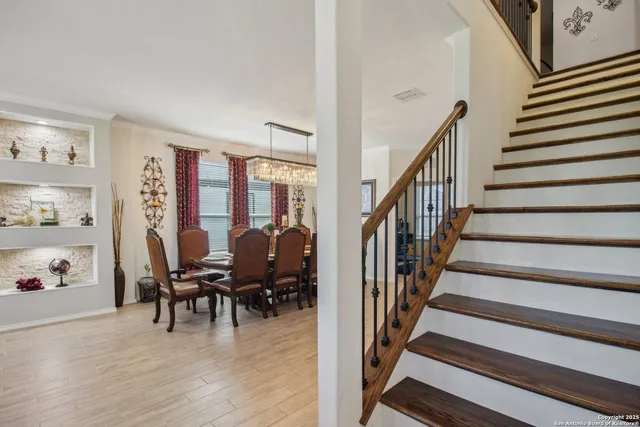 a view of a livingroom with furniture and workspace