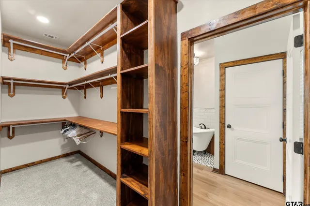 a bed room with a bed and a couch