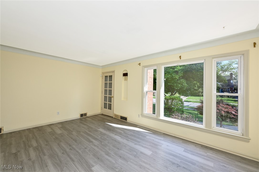 4033 Wyncote Road South Euclid, OH 44121 - Photo 8 of 25 Spare room featuring wood-type flooring