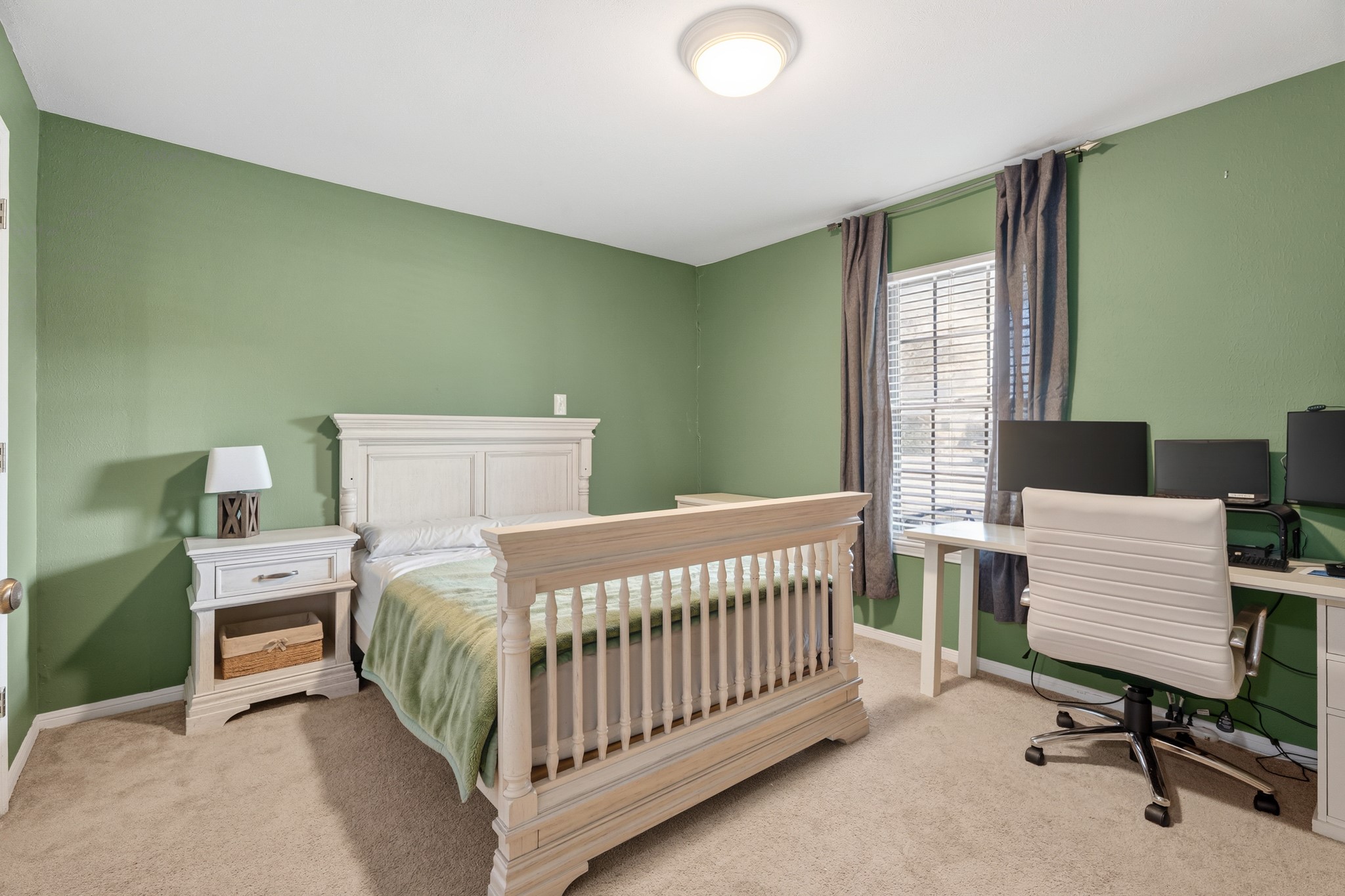 2104 Rose Road Pearland, TX 77581 - Photo 32 of 43 a bedroom with a bed and a desk
