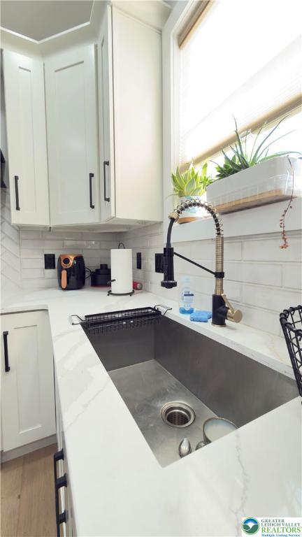 1425 Howertown Road, Unit B Catasauqua, PA 18032 - Photo 11 of 30 a kitchen with a sink a counter top space and cabinets