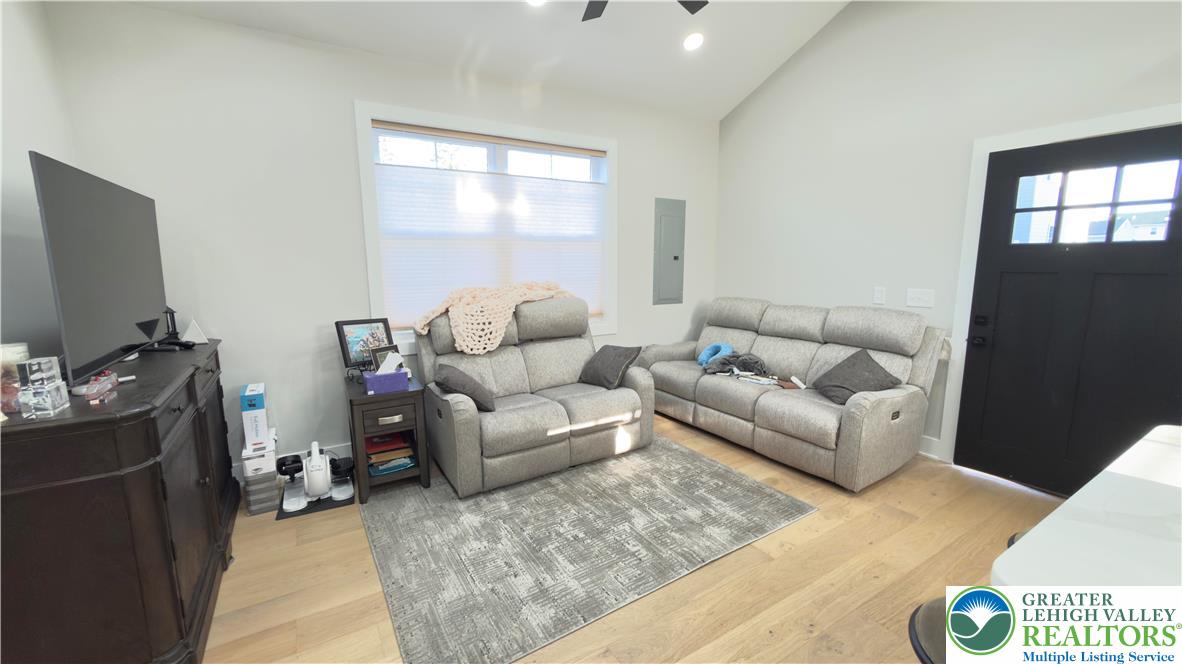 1425 Howertown Road, Unit B Catasauqua, PA 18032 - Photo 15 of 30 a living room with furniture and a flat screen tv