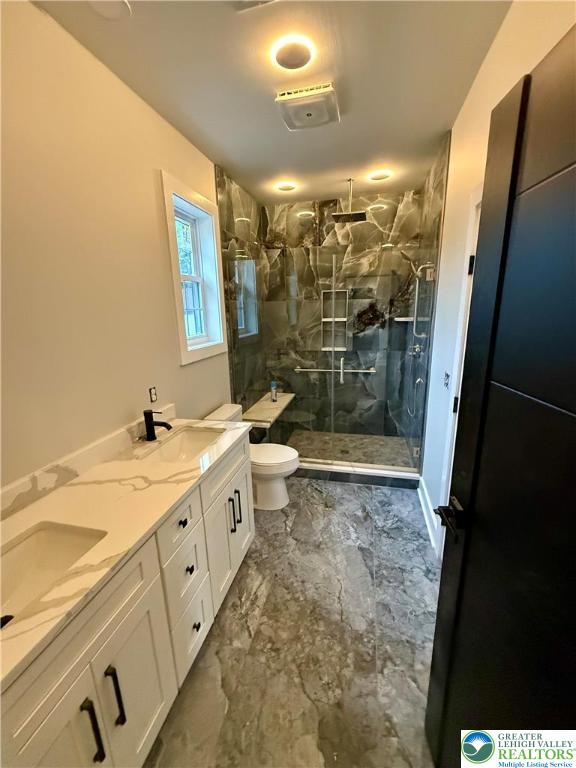 1425 Howertown Road, Unit B Catasauqua, PA 18032 - Photo 18 of 30 a bathroom with a granite countertop sink toilet and shower