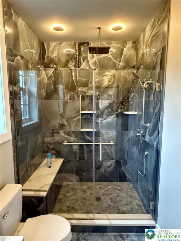 1425 Howertown Road, Unit B Catasauqua, PA 18032 - Photo 19 of 30 a bathroom with a toilet sink and shower