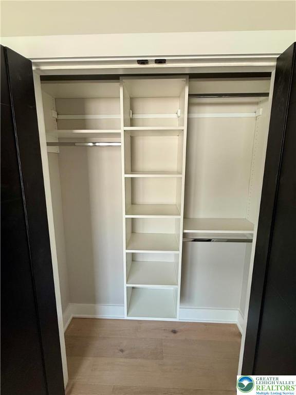 1425 Howertown Road, Unit B Catasauqua, PA 18032 - Photo 28 of 30 a view of walk in closet with empty racks
