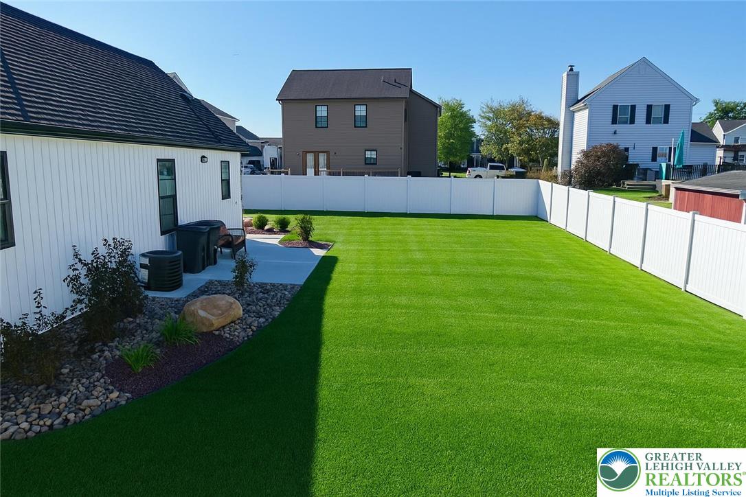 1425 Howertown Road, Unit B Catasauqua, PA 18032 - Photo 4 of 30 a view of house with backyard and furniture