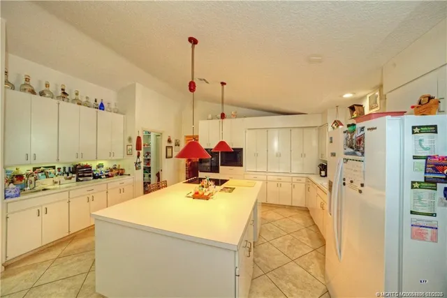 $705,000 | 5220 Southeast Burning Tree Circle, Stuart, FL 34997