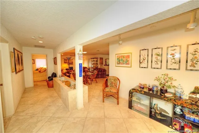 a view of a living room and dining room