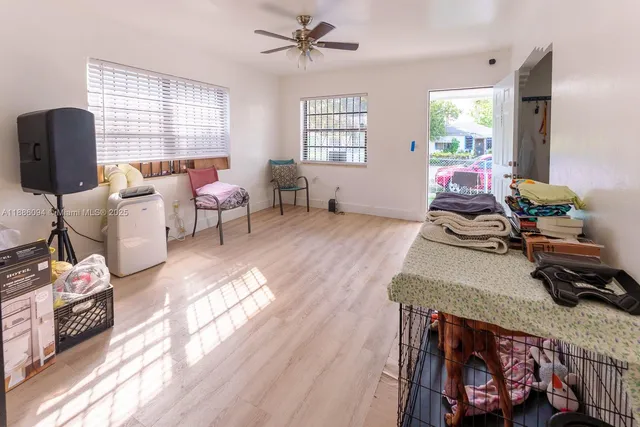 a living room with furniture and a window