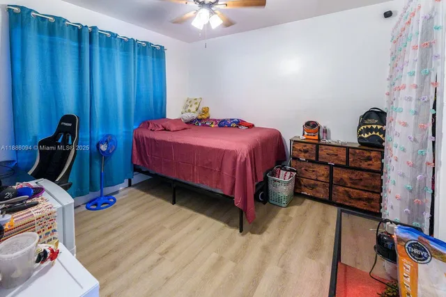 a bedroom with a bed and a closet