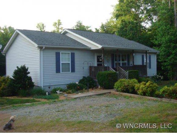 366 Baber Road Rutherfordton, NC 28139 - Photo 1 of 11 a front view of a house with garden