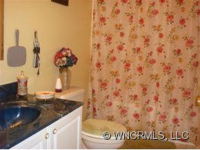 366 Baber Road Rutherfordton, NC 28139 - Photo 5 of 11 a kitchen with a sink and a stove