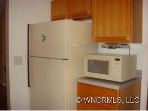 366 Baber Road Rutherfordton, NC 28139 - Photo 6 of 11 a white refrigerator freezer sitting inside of a kitchen