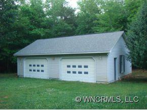 366 Baber Road Rutherfordton, NC 28139 - Photo 10 of 11 a view of a house with a garden