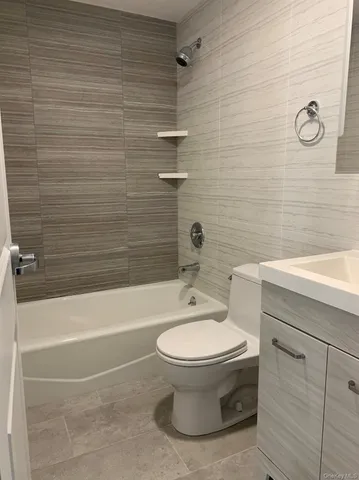 a bathroom with a toilet and a sink