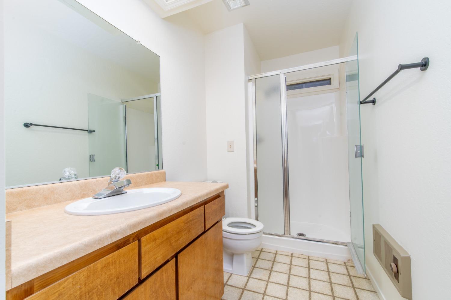 3961 7 Ridges Road Camino, CA 95709 - Photo 73 of 86 a bathroom with a sink toilet and shower