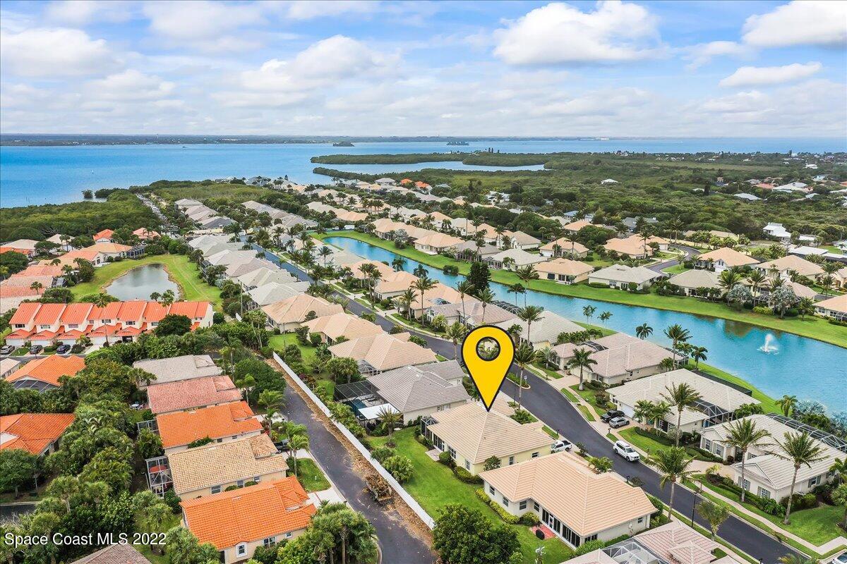 245 Clyde Street Melbourne Beach, FL 32951 - Photo 3 of 47 an aerial view of residential houses with outdoor space