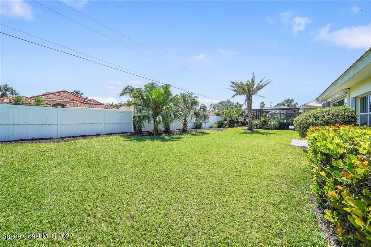 245 Clyde Street Melbourne Beach, FL 32951 - Photo 31 of 47 a view of an outdoor space and a yard