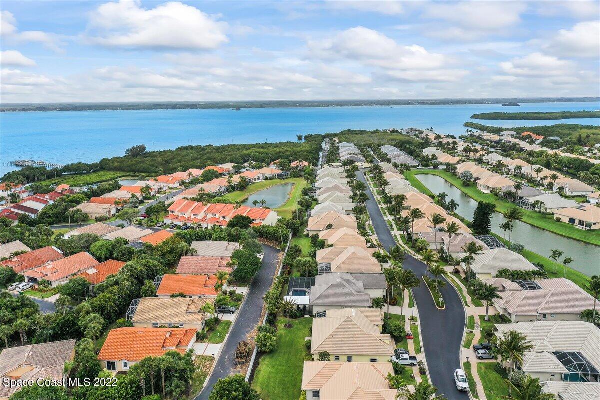 245 Clyde Street Melbourne Beach, FL 32951 - Photo 44 of 47 an aerial view of residential houses with outdoor space