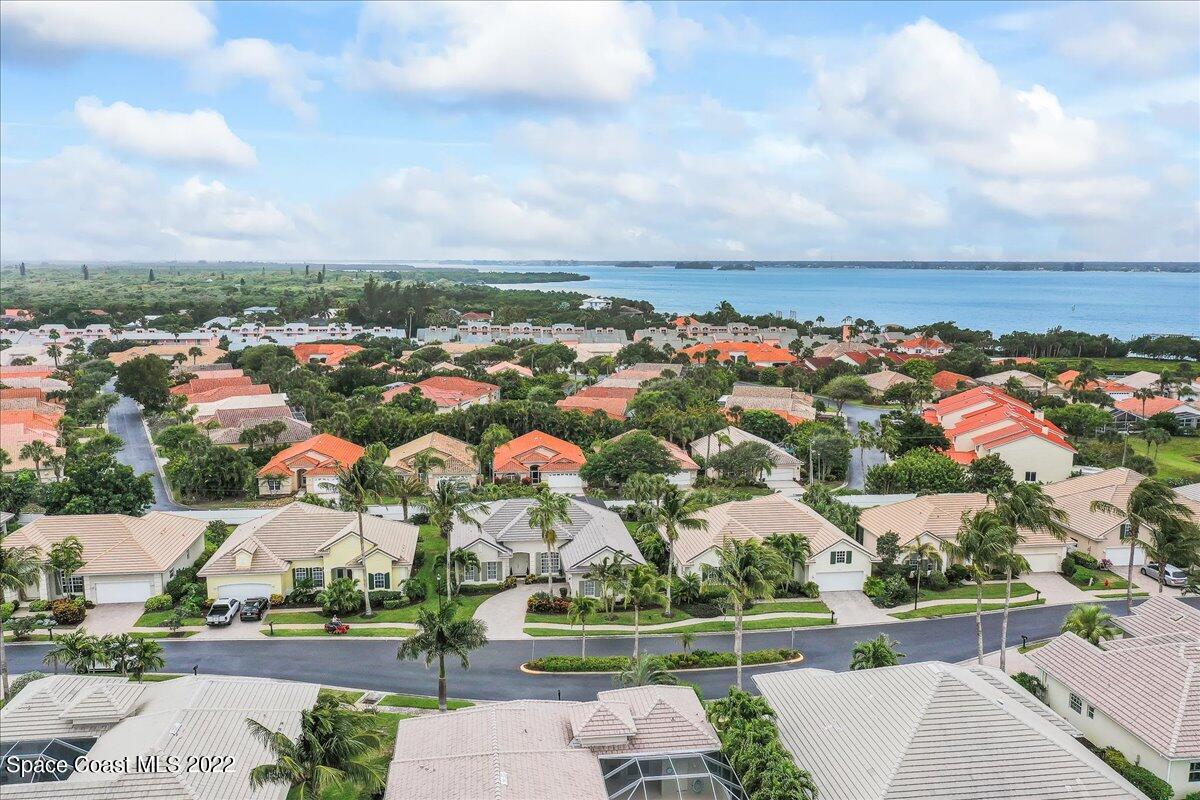 245 Clyde Street Melbourne Beach, FL 32951 - Photo 45 of 47 an aerial view of residential houses with outdoor space