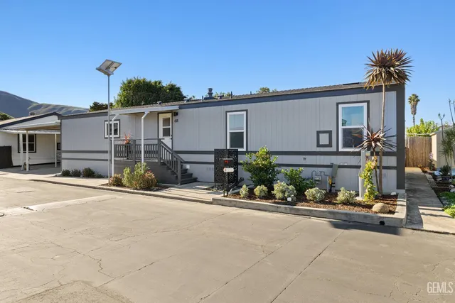 front view of a house with a street