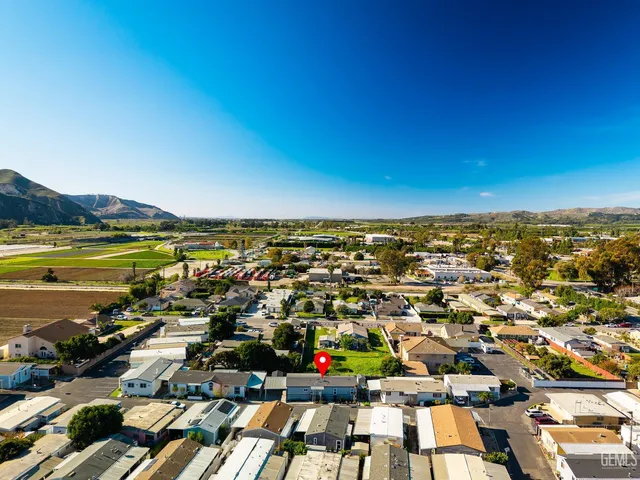 an aerial view of residential house with outdoor space