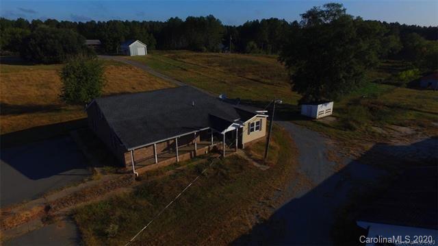 1621 Stack Road Monroe, NC 28112 - Photo 22 of 28 a view of a swimming pool with a yard
